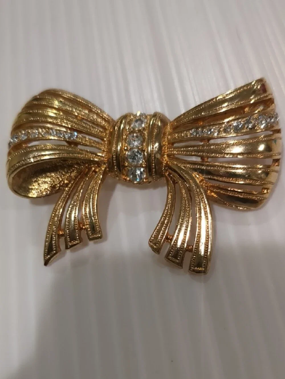 Vintage Czech gold-tone Bow Pin Brooch Clear Glass Rhinestones